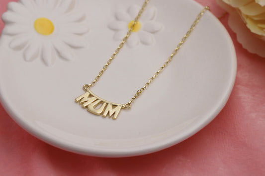 9ct Gold Mum Necklace on a jewellery holder