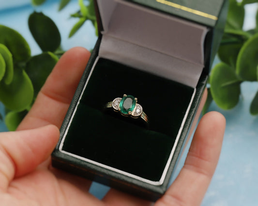 9ct gold diamond & emerald set trilogy ring in a vintage green jewellery ring box