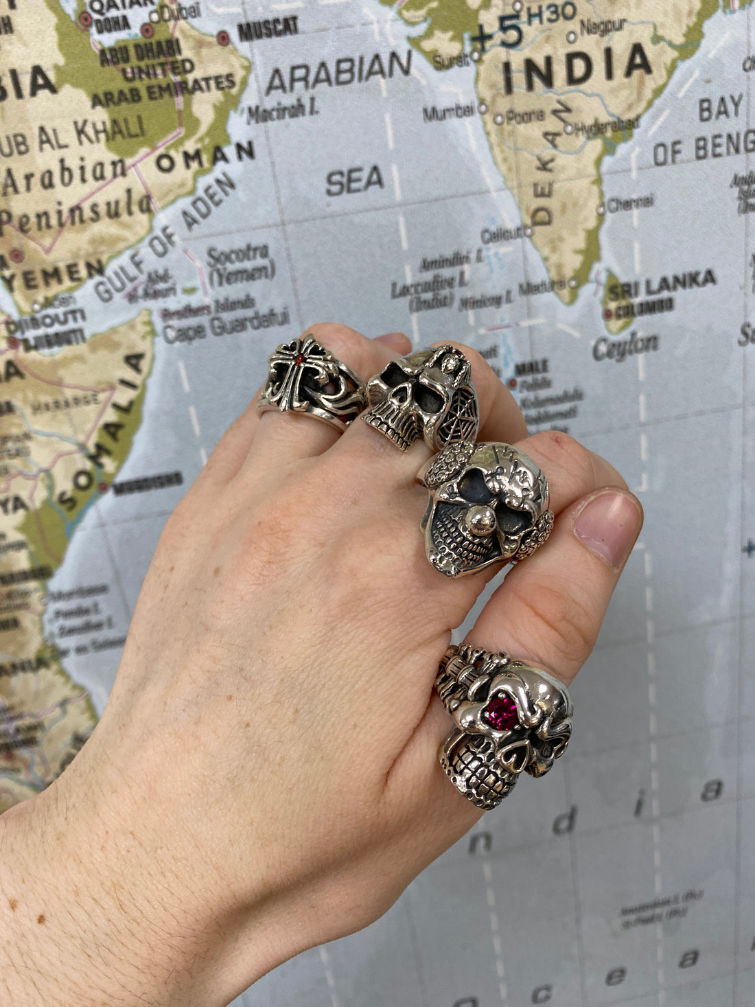 925 Silver Heavy Skull, Cross and Clown rings on a hand