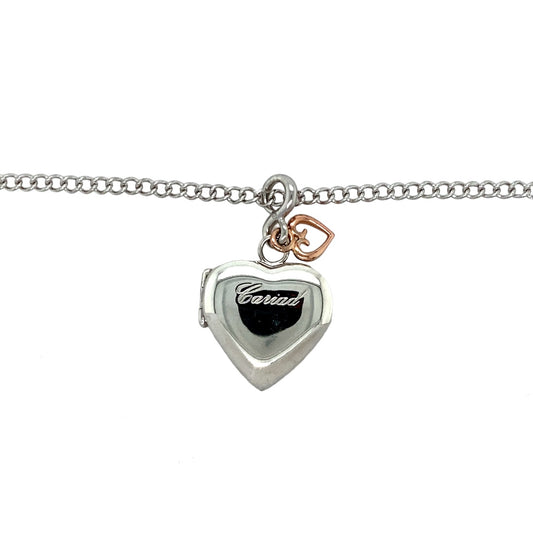 Preowned 925 Silver Clogau with 9ct Rose Gold Clogau Cariad Heart Locket Pendant on an 18" silver Clogau curb chain with the weight 11 grams. The pendant is 3.4cm long including the bail and the locket space is approximately 18mm by 18mm