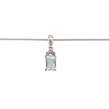 Load image into Gallery viewer, Preowned 9ct White Gold Diamond &amp; Aquamarine Set Pendant on an 18&quot; fine curb chain with the weight 1.50 grams. The pendant is 1.7cm including the bail and the aquamarine stone is 7mm by 5mm

