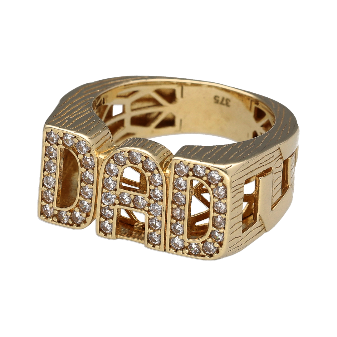 Bring bold sentiment and sparkling detail to your collection with this new 9ct yellow gold and cubic zirconia set Dad ring—a proud and polished design that blends classic styling with a touch of brilliance.
Design: The ring features an 11mm high front with the word "DAD" in bold raised lettering, framed by glittering cubic zirconia accents that enhance its standout appeal.