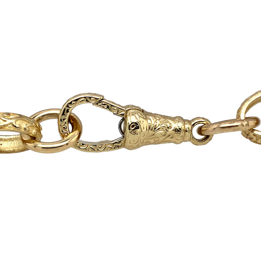 New 9ct Yellow Gold 8.5" Engraved Belcher Bracelet with the weight 22.40 grams. The link are 10mm width and are alternating in plain and patterned. The clasp is also patterned