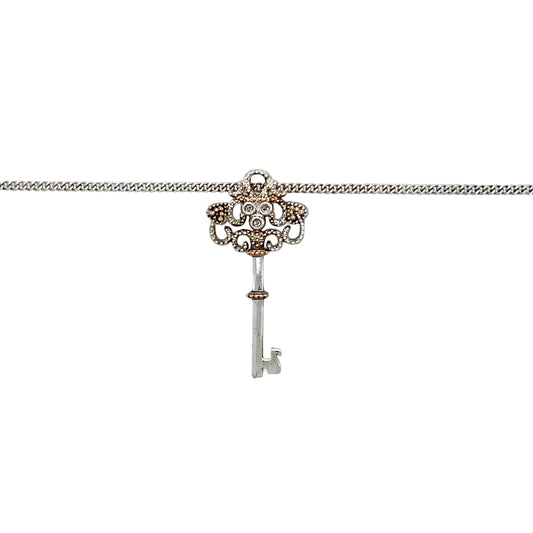 Preowned 925 Silver Clogau with 9ct Rose Gold Clogau Kensington Key Pendant on an 18" Silver Clogau curb chain. The necklace has the weight 4.70 grams and the pendant is 3cm long