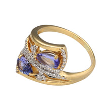 Load image into Gallery viewer, Preowned 18ct Yellow and White Gold Diamond &amp; Tanzanite Set Wrap Around Dress Ring in size R with the weight 7.80 grams. The tanzanite stones are each 7mm by 5mm
