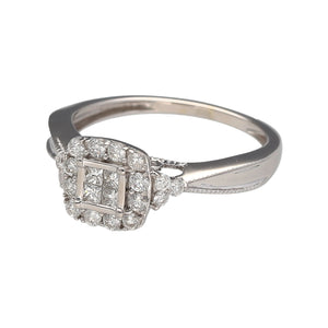 Preowned 9ct White Gold & Diamond Set Halo Illusion Cluster Ring in size K with the weight 2.20 grams. There is approximately 40pt of diamond content set in the ring