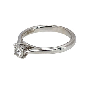 Preowned 9ct White Gold & Diamond Set Solitaire Ring in size H to I with the weight 2.10 grams. The diamond is approximately 10pt 