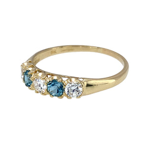 Preowned 9ct Yellow Gold & White and Blue Coloured Cubic Zirconia Set Band Ring in size R with the weight 1.60 grams. The stones are each 3mm diameter