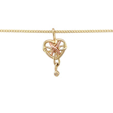 Load image into Gallery viewer, Preowned 9ct Yellow and Rose Gold &amp; Diamond Set Clogau Celtic Heart Pendant on an 18&quot; Clogau pendant curb chain with the weight 3.80 grams. The pendant is 2.2cm including the bail
