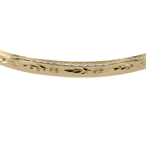 Preowned 9ct Yellow Solid Gold Patterned Bangle with the weight 6.80 grams. The bangle diameter is 6.7cm and the bangle width is 5mm