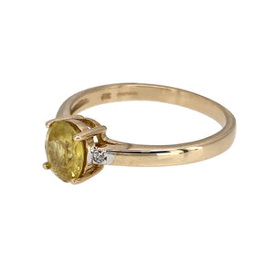 Preowned 9ct Yellow Gold Diamond & Yellow Cubic Zirconia Set Ring in size R with the weight 2.60 grams. The yellow stone is 7mm by 6mm