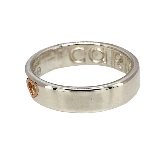 Preowned 925 Silver with 9ct Rose Gold Clogau Cariad Heart 'Take my Heart' Band Ring in size N with the weight 3.80 grams. The band is approximately 5mm wide