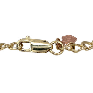 Preowned 9ct Yellow and Rose Gold Clogau 7.25" Charm Bracelet with the total weight 13.90 grams. The charm bracelet holds eight charms which are a Celtic dragon, a swirl, a cariad heart, daffodil, diamond set triskele, lovespoon, tree of life circle and tree of life teardrop