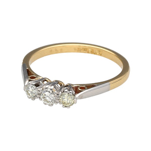 Preowned 18ct Yellow Gold & Platinum Diamond Set Trilogy Ring in size K with the weight 2.20 grams. There is approximately 24pt - 27pt of diamond content in total at approximate clarity Si2 and colour L - N