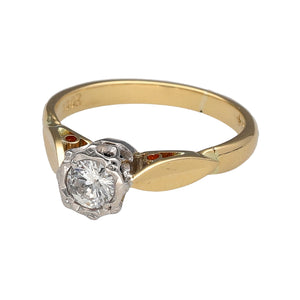 Preowned 18ct Yellow and White Gold & Diamond Set Antique Style Solitaire Ring in size H with the weight 2.70 grams. The diamond is approximately 25pt with the approximate clarity Si2 and colour K - M