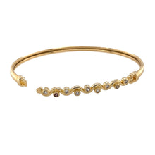 Load image into Gallery viewer, Preowned 9ct Yellow Gold &amp; Cubic Zirconia Set Hinged Bangle with the weight 6.20 grams. The front of the bangle is 5mm wide and the bangle diameter is 6.5cm
