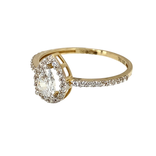 New 9ct Yellow and White Gold & Cubic Zirconia Set Teardrop Halo Ring in size P with the weight 1.30 grams. The front of the ring is 10mm high and the center stone is 6mm by 4mm
