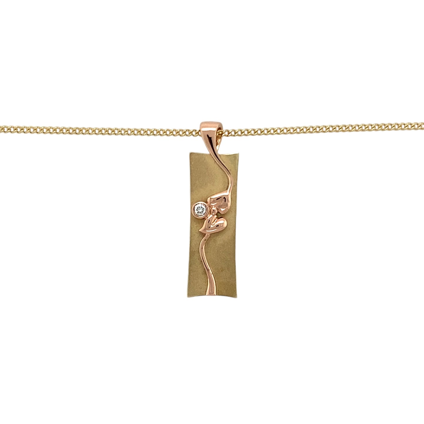 Preowned 9ct Yellow and Rose Gold & Diamond Set Clogau Ingot Vine of Life Pendant on an 18" curb chain with the weight 10.20 grams. The pendant is 3.1cm long including the bail