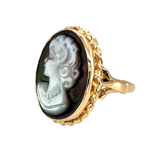 Preowned 9ct Yellow Gold & Grey Cameo Set Ring in size M with the weight 6.30 grams. The grey abalone shell style and white cameo stone is 20mm by 15mm