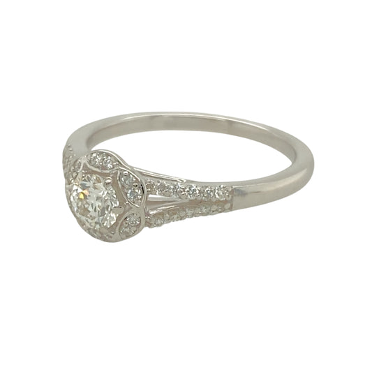 Add a touch of sparkle and sophistication to your jewellery collection with this pre-owned 9ct white gold and diamond set halo solitaire ring.
Design: Featuring a classic solitaire diamond encircled by a dazzling halo of smaller diamonds, this ring offers timeless elegance with added brilliance.
Material: Made from 9-carat white gold, providing a sleek and polished finish that enhances the beauty of the diamonds.
Diamond Detail: The halo setting amplifies the sparkle of the central stone