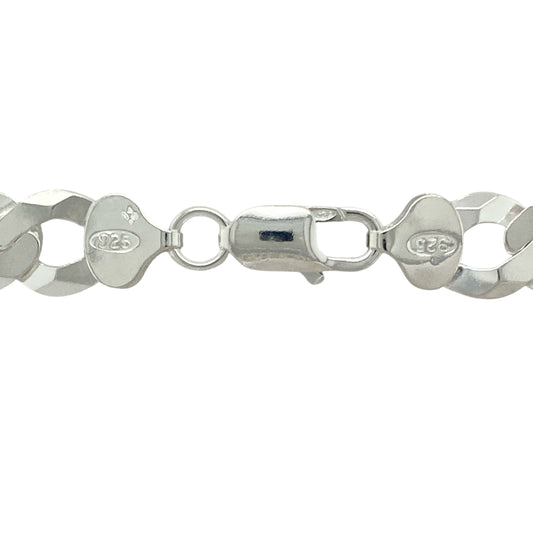 Make a bold and lasting impression with this new 925 silver 22" curb chain, offering substantial weight and classic styling for a powerful and timeless look:
Design: A traditional curb link chain featuring wide, flat interlocking links that create a sleek, flexible drape and a confident, polished appearance.
Material: Crafted from solid 925 sterling silver, the chain features a bright, polished finish that highlights its clean, bold design.