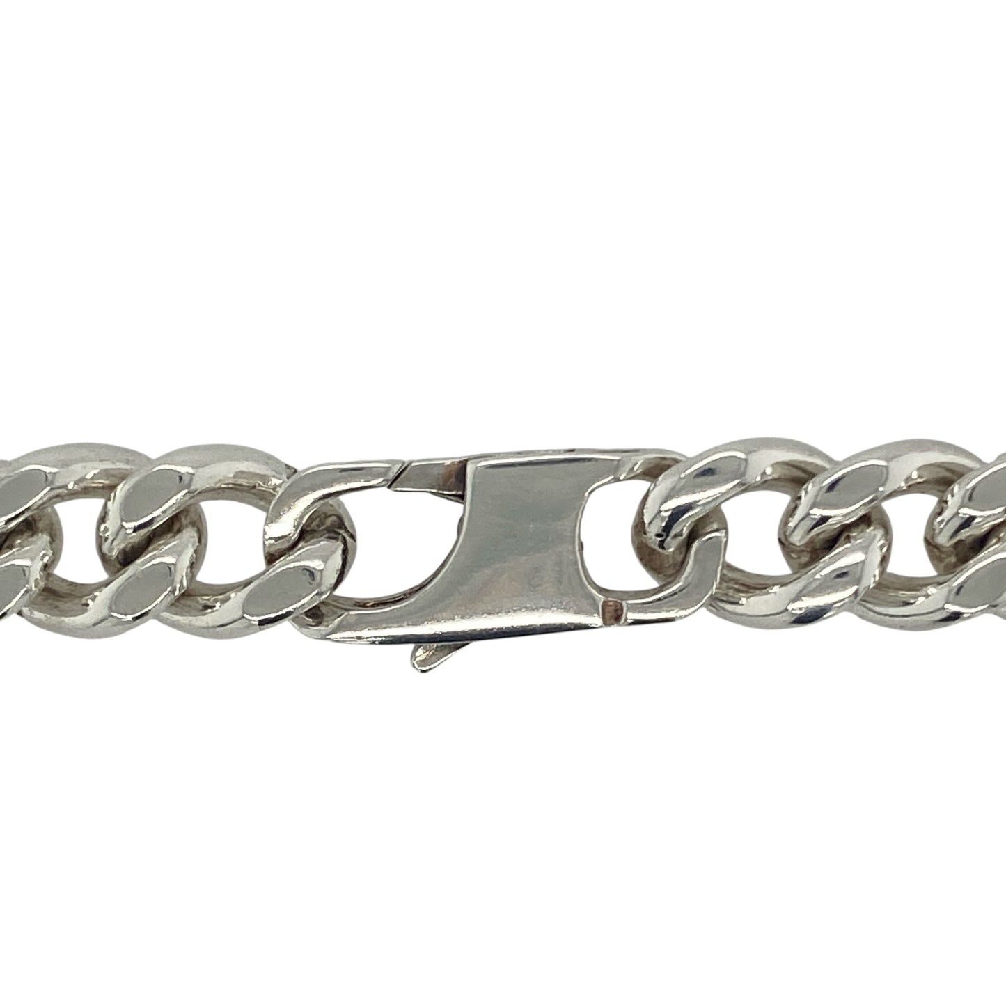 Bring bold sophistication and striking presence to your collection with this pre-owned 925 silver 18" curb chain, offering a powerful blend of classic design and substantial weight—perfect for making an unmistakable statement.
Design: The chain features a traditional curb link design with an impressive 11mm width, creating a strong, polished look that demands attention and adds confident style to any outfit.