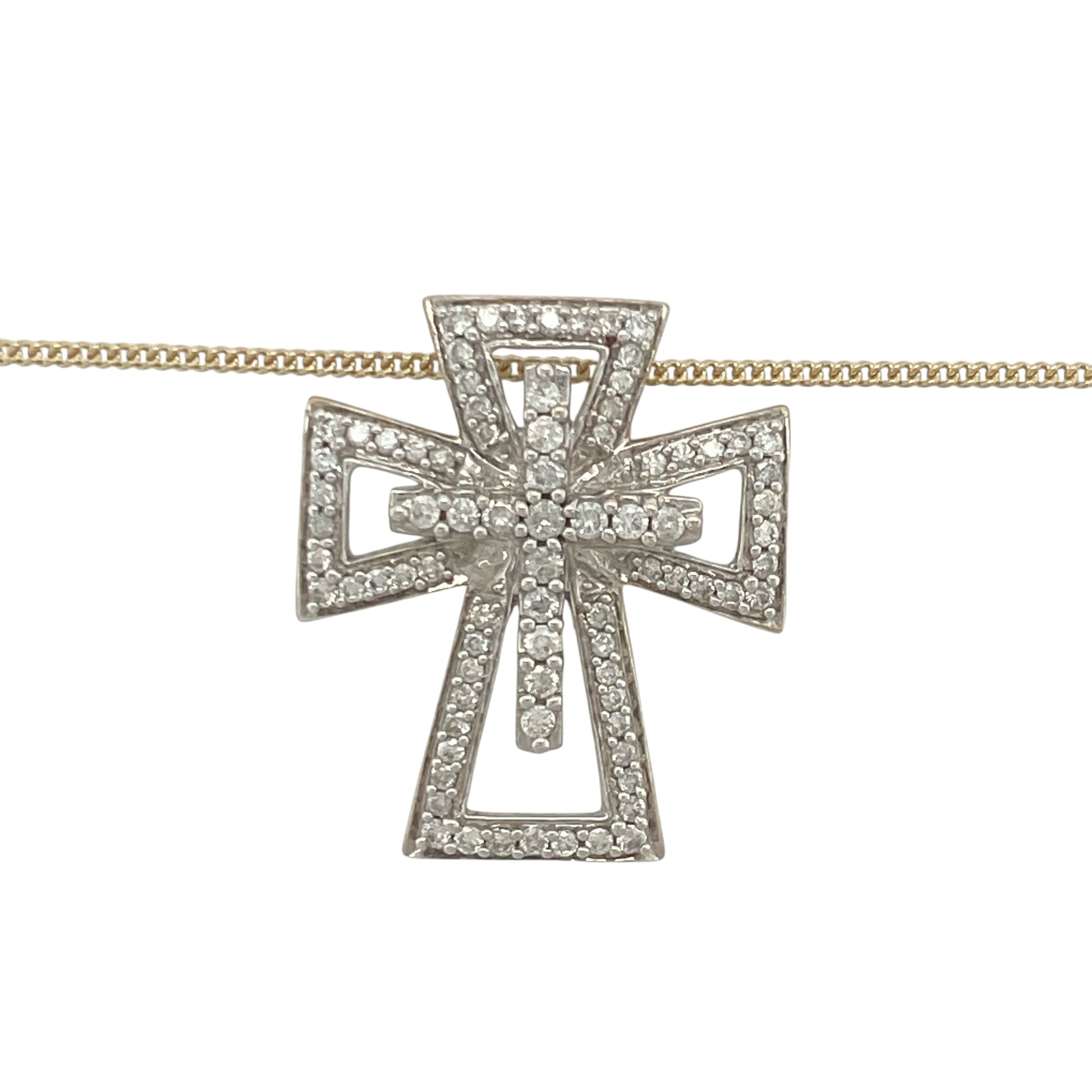 Bring graceful detail and meaningful sparkle to your collection with this pre-owned 9ct yellow gold and diamond set open fancy cross pendant necklace—an elegant design blending timeless symbolism with delicate brilliance.
Design: The pendant measures 2.7cm in length and features an openwork fancy cross design with flowing curves and diamond accents, creating a refined and decorative silhouette.