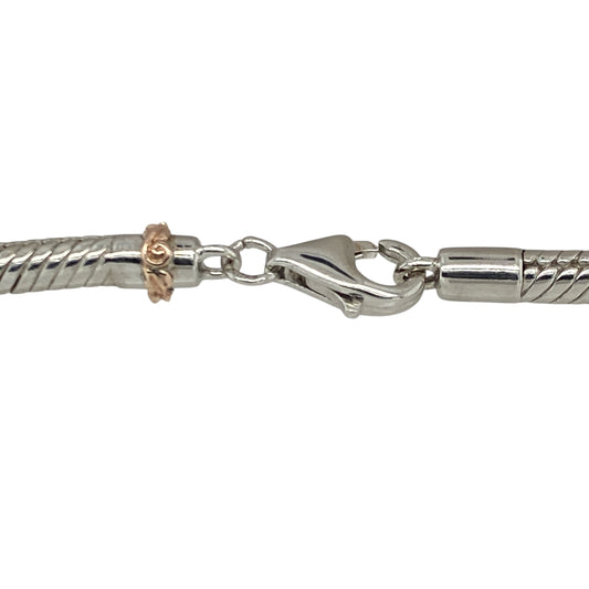 Bring timeless style and versatile elegance to your collection with this pre-owned 925 silver and 9ct rose gold Clogau bead charm braceletβperfect for personalising with your favourite charms or wearing as a classic statement piece.
Design: The bracelet features a polished bead-style design that offers both strength and flexibility, finished with Clogauβs signature 9ct rose gold detailing for a touch of warmth and sophistication.
