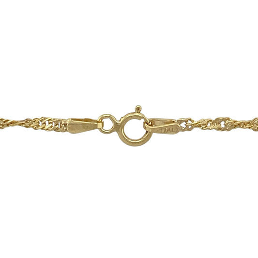 Add a touch of elegant sparkle to your look with this pre-owned 9ct yellow gold Singapore chain, known for its graceful twist and fluid movement—perfect for everyday wear or subtle sophistication.
Design: The chain features a delicate twisted link pattern that reflects light beautifully, giving it a refined shimmer from every angle.
Material: Made from 9-carat yellow gold, offering a warm hue and polished finish that complements any style.