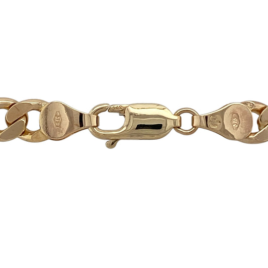 Bring bold presence and timeless strength to your jewellery collection with this pre-owned 9ct yellow solid gold curb chain, a substantial statement piece designed for confident everyday wear or standout styling.
Design: The chain features a classic curb link profile with broad, flat interlocking links that sit smoothly and securely around the neckline. With an impressive link width of approximately 6mm, it delivers a strong and commanding look.