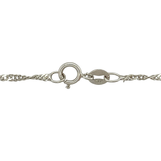 Bring sleek sophistication and delicate sparkle to your jewellery collection with this pre-owned 9ct white gold Singapore chain, a refined piece perfect for everyday wear or subtle layering.
Design: This chain features the distinctive twisted Singapore link, creating a fluid, light-catching profile with elegant movement.
Material: Made from 9-carat white gold, the bright polished finish offers a modern and versatile look that complements any style.