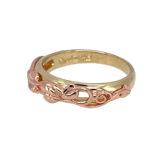 Preowned 9ct Yellow and Rose Gold Clogau Tree of Life Band Ring in size L with the weight 3 grams. The front of the band is 5mm wide