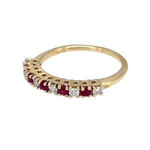 Preowned 9ct Yellow Gold Diamond & Ruby Set Band Ring in size M with the weight 1.70 grams. The ruby stones are each approximately 1.5mm diameter and there is approximately 19pt of diamond content in total