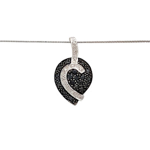 Preowned 9ct White Gold & White Diamond with Black Moissanite Set Leaf Pendant on an 18" box chain with the weight 3.40 grams. The pendant is 2.5cm long including the bail