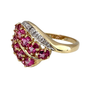 Preowned 9ct Yellow and White Gold Diamond & Pink Cubic Zirconia Cluster Dress Ring in size P with the weight 3.80 grams. The front of the ring is 15mm and the pink stones are each 3mm by 4mm