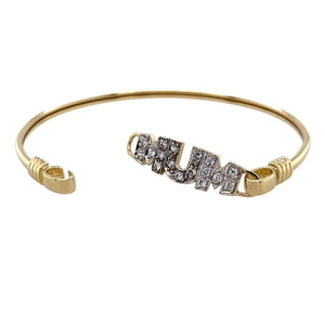 Preowned 9ct Yellow and White Gold & Cubic Zirconia Set Mum Bangle with the weight 7.80 grams. The front of the bangle is 8mm high and the bangle diameter is 6.2cm