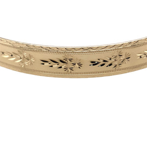 Preowned 9ct Yellow Solid Gold Patterned Expanding Bangle with the weight 17.60 grams and bangle width is 9mm. The bangle diameter is 6.7cm when closed and 7.7cm when fully expanded