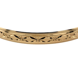 Preowned 9ct Yellow Solid Gold Patterned Engraved Bangle with the weight 10.30 grams. The bangle width is 6mm and the bangle diameter is 6.7cm