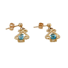 Load image into Gallery viewer, Preowned 9ct Yellow Gold &amp; Blue Topaz Set Drop Earrings with the weight 2 grams. The blue topaz stones are each 6mm by 4mm
