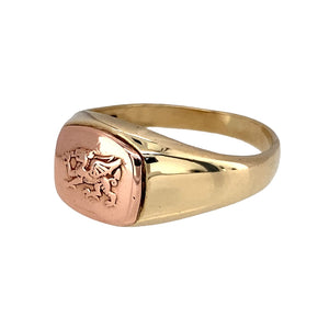 Preowned 9ct Yellow and Rose Gold Clogau Welsh Dragon Signet Ring in size S with the weight 6.60 grams. The front of the ring is 10mm high
