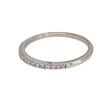 Load image into Gallery viewer, Preowned 9ct White Gold &amp; Diamond Set 1.5mm wide Band Ring in size Q with the weight 1.60 grams. There is approximately 0.7pt of diamond content in total
