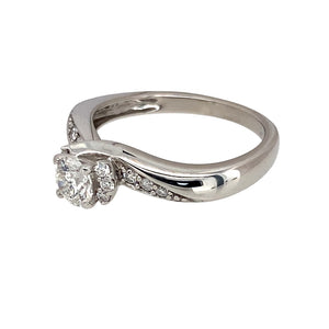 Preowned 9ct White Gold & Diamond Set Solitaire Ring in size L with the weight 2.90 grams. There is approximately 50pt of diamond content in total with approximate clarity i1 and colour J - K