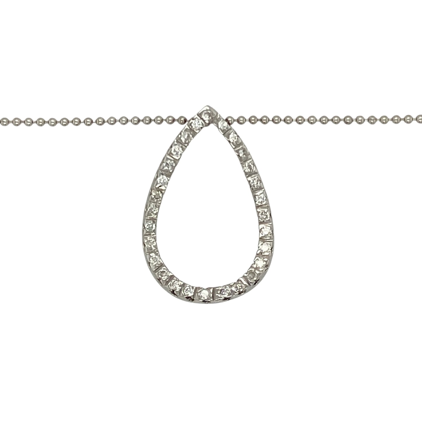 Bring graceful sparkle and modern elegance to your jewellery collection with this pre-owned 18ct white gold diamond open teardrop pendant on an 18" ball chain—a refined piece with flowing lines and timeless appeal.
Design: The 2.2cm long open teardrop pendant features diamond accents that add delicate brilliance to its elegant, curved shape.
Material: Made from 18-carat white gold, the pendant and polished ball chain offer a cool-toned finish that enhances the shimmer of the diamonds.