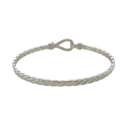 Bring bold shine and symbolic elegance to your jewellery collection with this new solid 925 silver and cubic zirconia horseshoe bangle—a timeless piece that blends luck, sparkle, and polished style.
Design: The 11mm high front features a classic horseshoe motif adorned with shimmering cubic zirconia stones, symbolising good fortune and adding eye-catching brilliance.
Material: Made from solid 925 sterling silver, the high-polish finish enhances the smooth shine and sparkle of the stones.