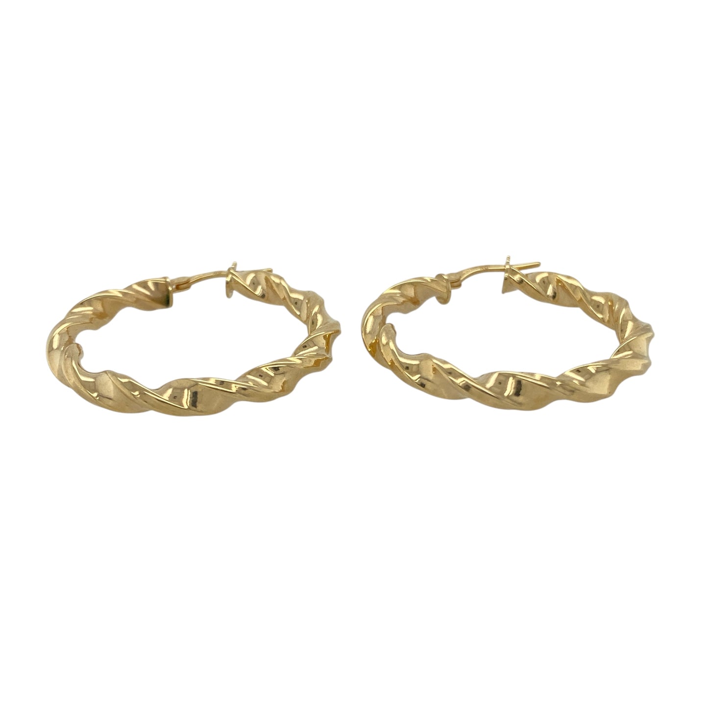 Bring warm elegance and contemporary texture to your collection with these new 9ct yellow gold twisted hoop creole earrings, offering a bold design and refined shine—perfect for making a sophisticated statement.
Design: The earrings feature a stylish twisted hoop creole style, measuring approximately 33mm in diameter. The twisted detailing adds dynamic movement and a modern edge to this classic silhouette.