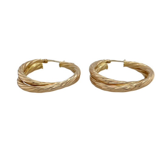 Make a bold statement with these pre-owned 9ct yellow gold double hoop twist creole earrings—stylish, eye-catching, and full of movement.
Design: These earrings feature an elegant double hoop design with a twisted creole shape, creating layered curves that catch the light from every angle.
Material: Made from 9-carat yellow gold, the high-polish finish enhances the sculptural form and adds a luxurious golden glow.