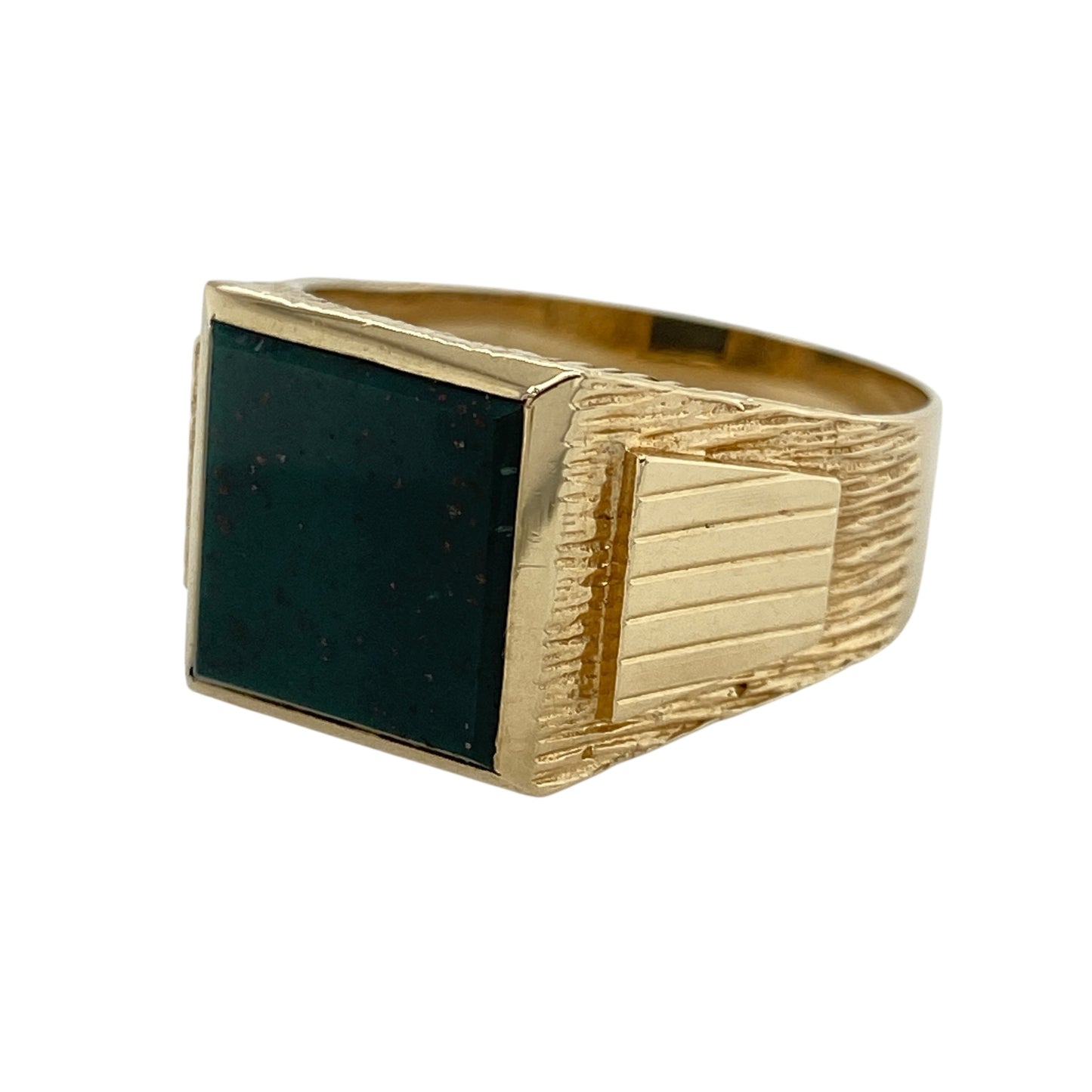Bring rich colour and bold presence to your collection with this pre-owned 9ct gold bloodstone square signet ring—perfect for making a distinguished statement or adding a touch of heritage style to your look.
Design: The ring features an 11mm by 11mm square bloodstone at the centre, framed by patterned shoulders for added detail and character.
Material: Made from 9-carat gold, the polished finish complements the deep green of the bloodstone and highlights the intricate shoulder design.