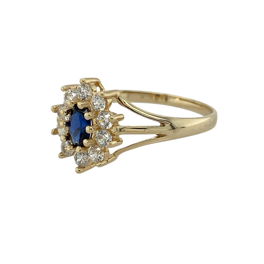 Bring classic elegance and sparkling detail to your collection with this pre-owned 9ct yellow gold sapphire and cubic zirconia cluster ring, offering timeless style and refined beauty—perfect for both everyday wear and special occasions.
Design: The ring features a 5mm by 3mm oval sapphire at the centre, surrounded by a cluster of white cubic zirconias for a bright and eye-catching finish.