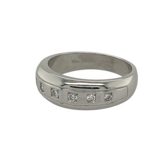 Bring refined sparkle and timeless elegance to your collection with this pre-owned 18ct white gold diamond band ring, a luxurious design perfect for both everyday wear and special occasions.
Design: The ring features a 6mm wide band adorned with diamonds, with a total diamond content of approximately 0.21ct, adding subtle brilliance across the front of the ring.
Material: Made from 18-carat white gold, the polished finish enhances the cool tones of the metal while complementing the sparkle of the diamonds.