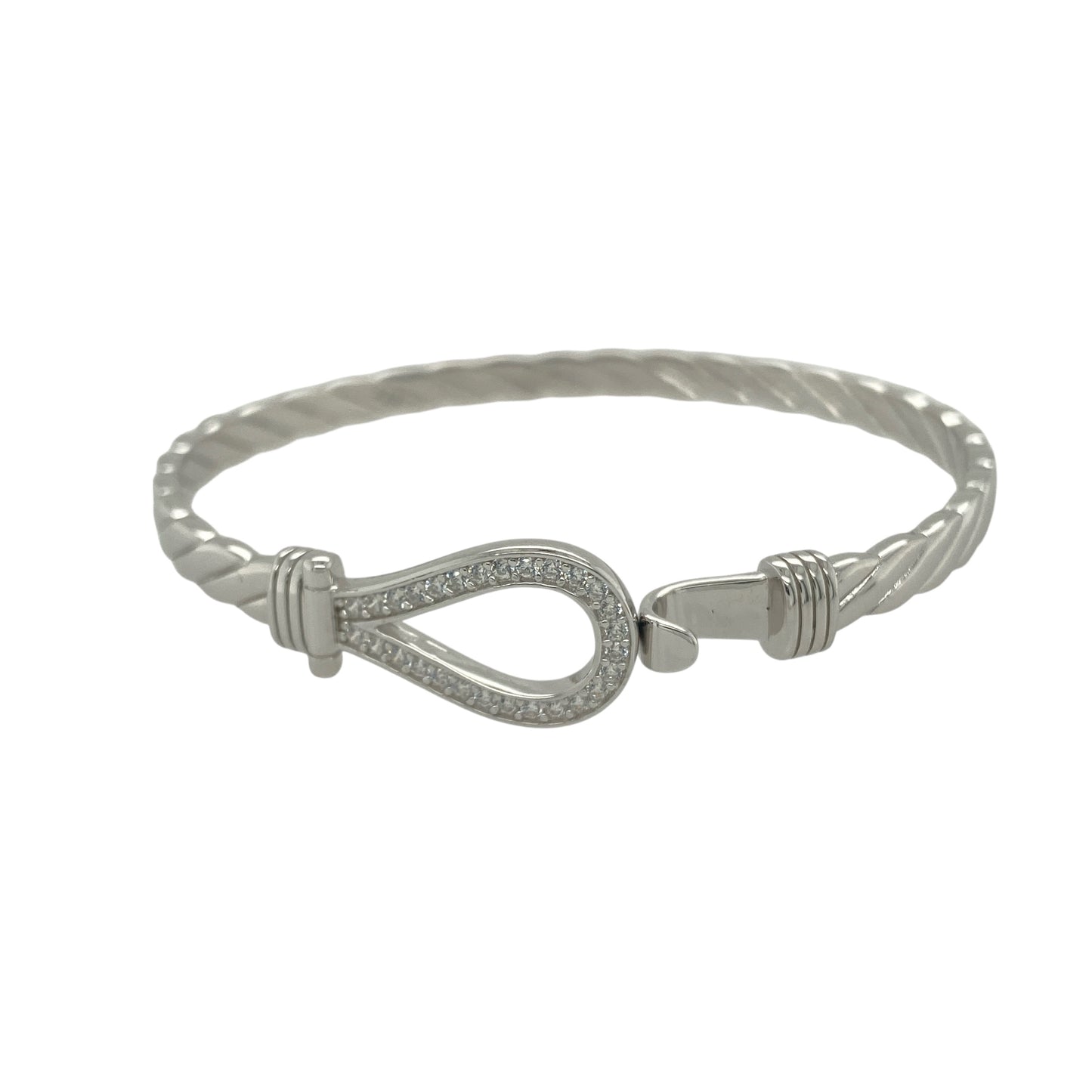 Bring charm and sparkle to your collection with this new 925 silver cubic zirconia children’s horseshoe bangle, a delightful design symbolising luck and happiness.
Design: The bangle features an 11mm high front with a classic horseshoe motif, accented with sparkling cubic zirconia stones for a bright and elegant finish.
Material: Made from solid 925 sterling silver, the polished surface enhances the shine and adds a sleek, refined look.